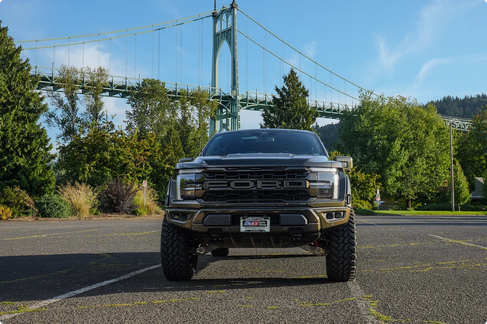 Front view of the giveaway Raptor beside the bridge